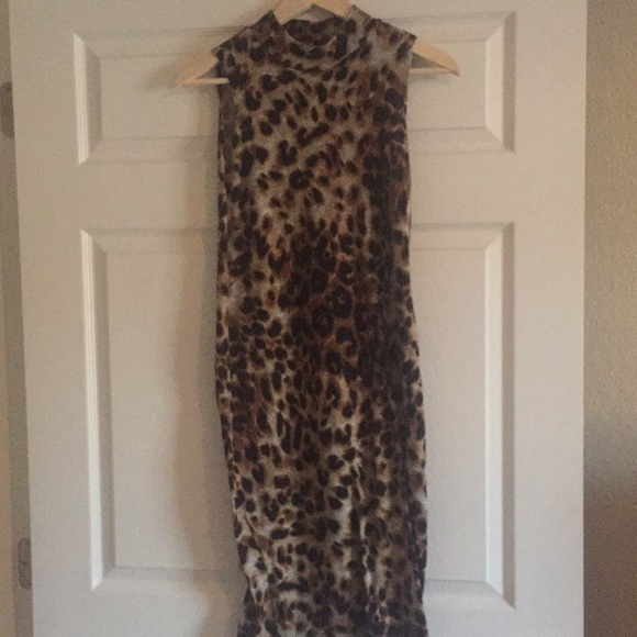 Dresses & Skirts - Animal print sleeveless bodycon dress.